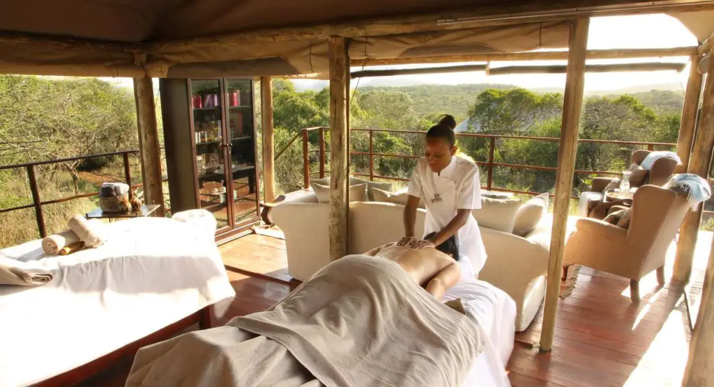 Go on a safari at Hluhluwe-Umfolozi in the private reserve of Thanda Safari Lodge and relax in their spa